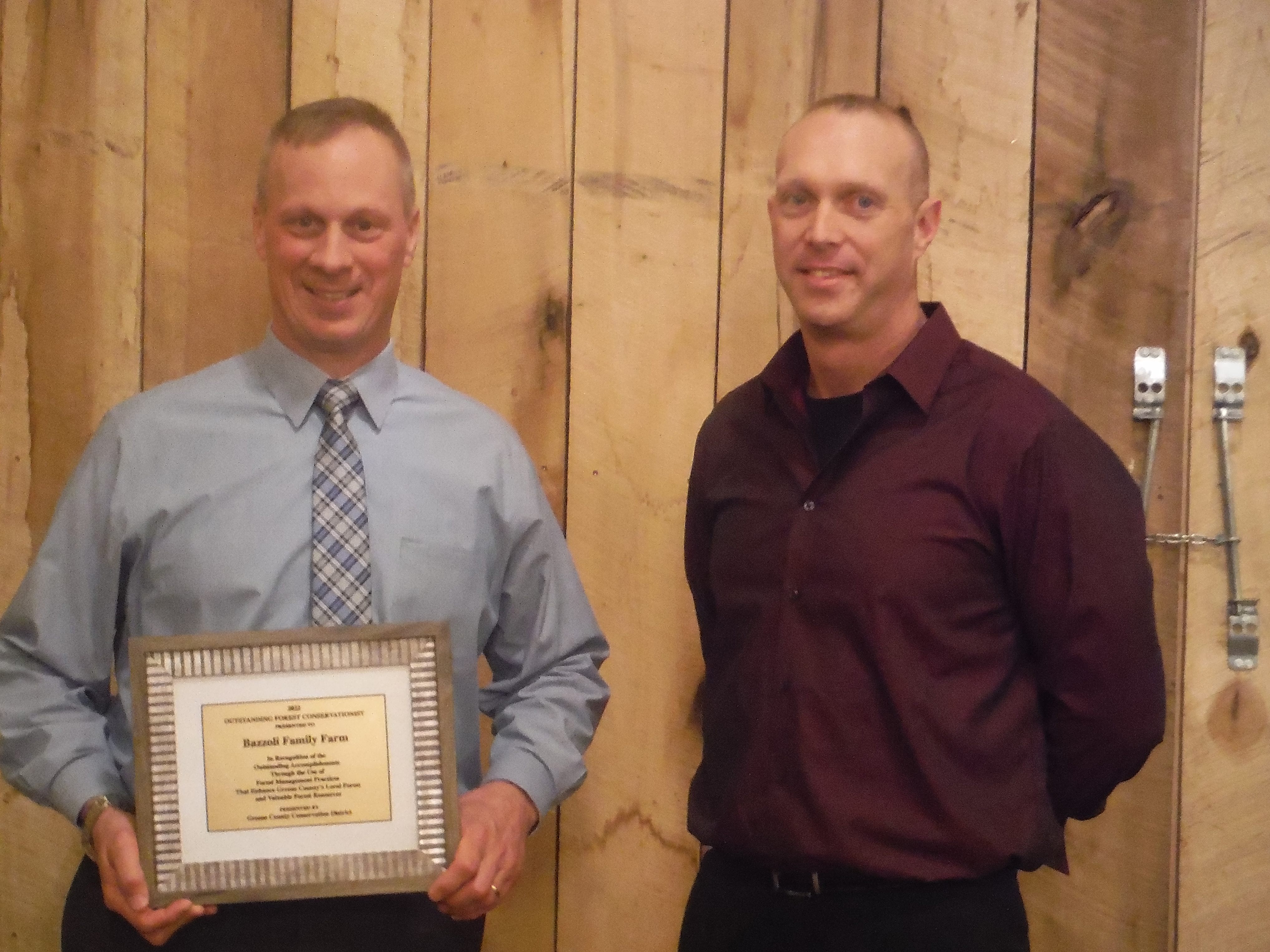 Dan Bazzoli was presented the 2022 Outstanding Forest Conservationist Award by Russell Gibbs, PA DCNR Service Forester at the Greene County Conservation DistrictÃ¢â‚¬â„¢s annual award ceremony on Wednesday, Dec. 14.